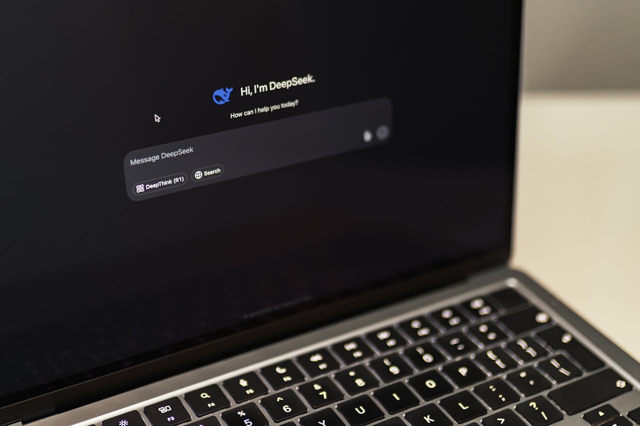 A MacBook displaying the DeepSeek AI interface, showcasing digital innovation.